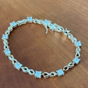 Elegant Roman Silver Toned and CZ Infinity Bracelet